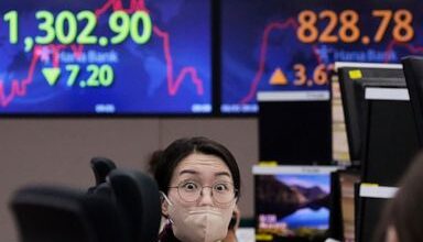 World stock markets mixed ahead of US jobs data