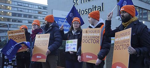 Thousands of doctors in Britain walk off the job in their longest-ever strike