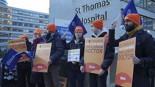 Thousands of doctors in Britain walk off the job in their longest-ever strike