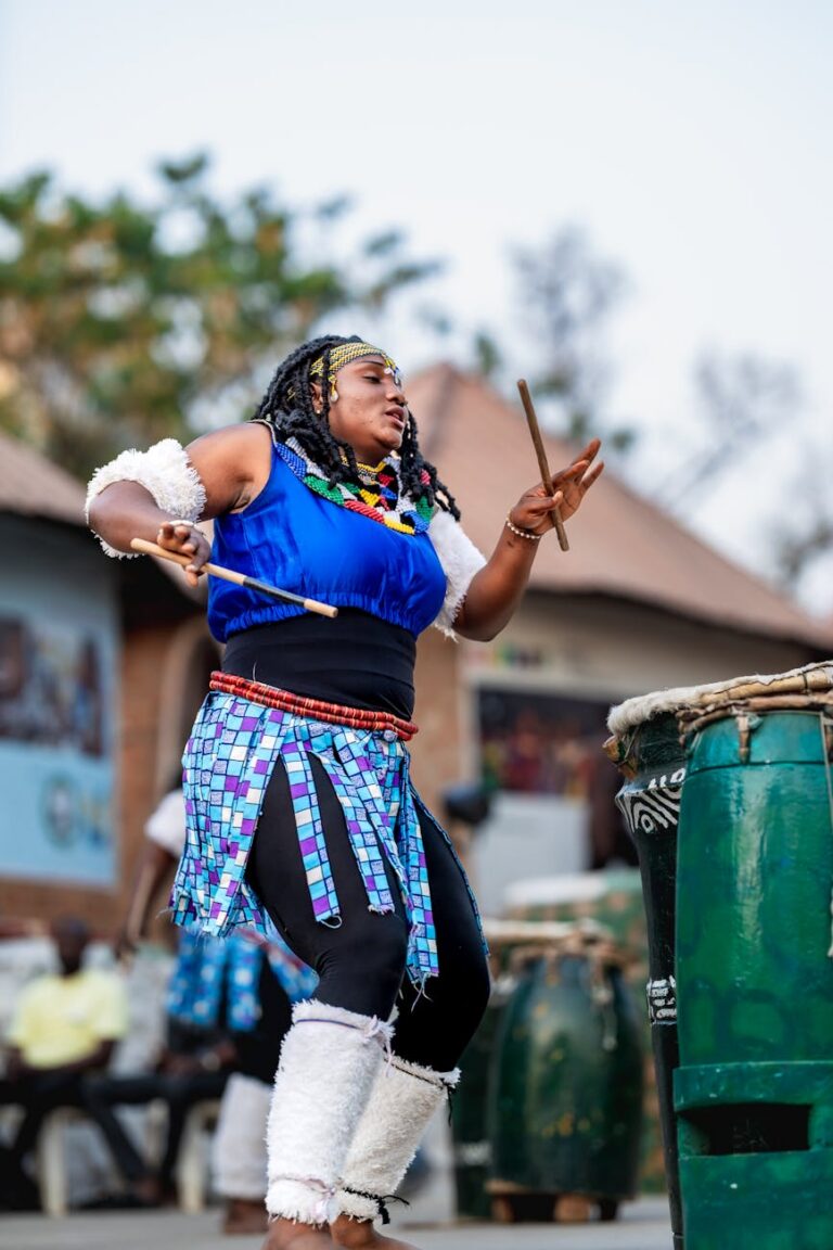colorful nigerian drummer performing at festival