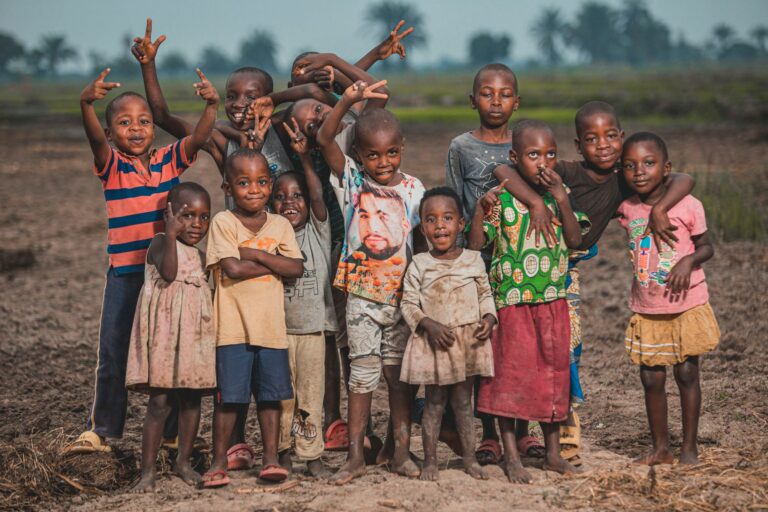 children standing together on field