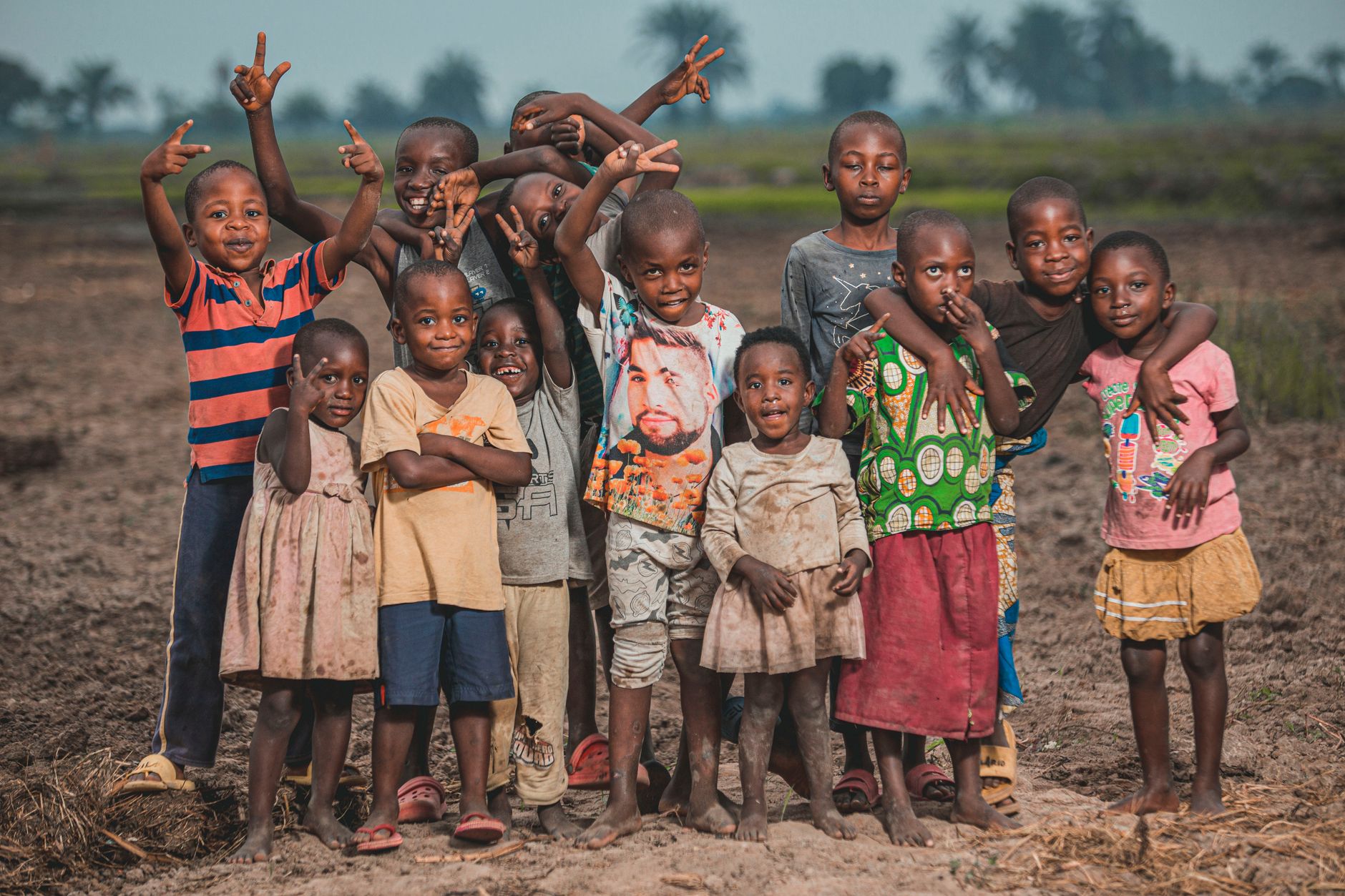 children standing together on field